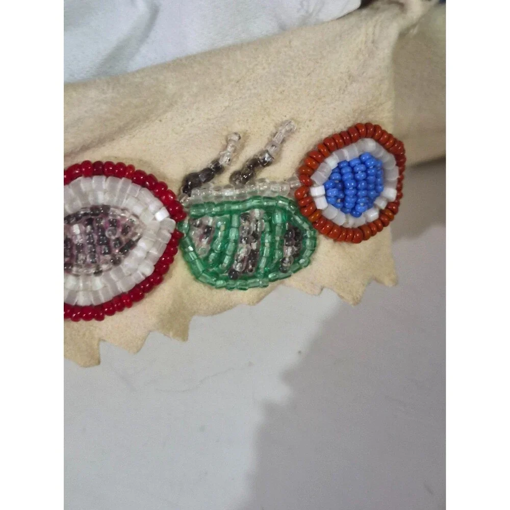 Vintage Crow Beaded Hide Moccasins featuring Intricate Colorful Glass Beadwork